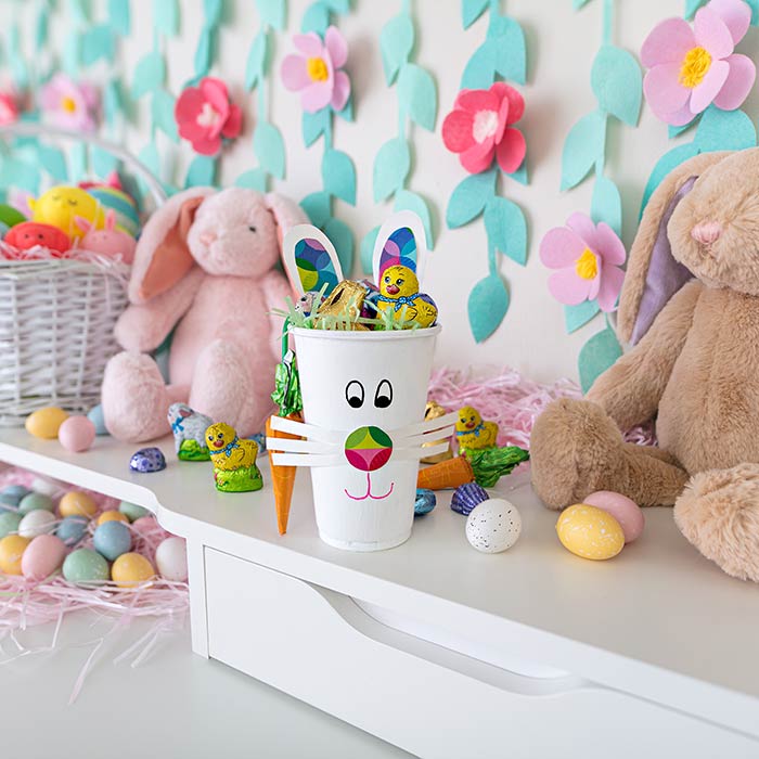 easter bunny treat cup craft. front view filled with candy.