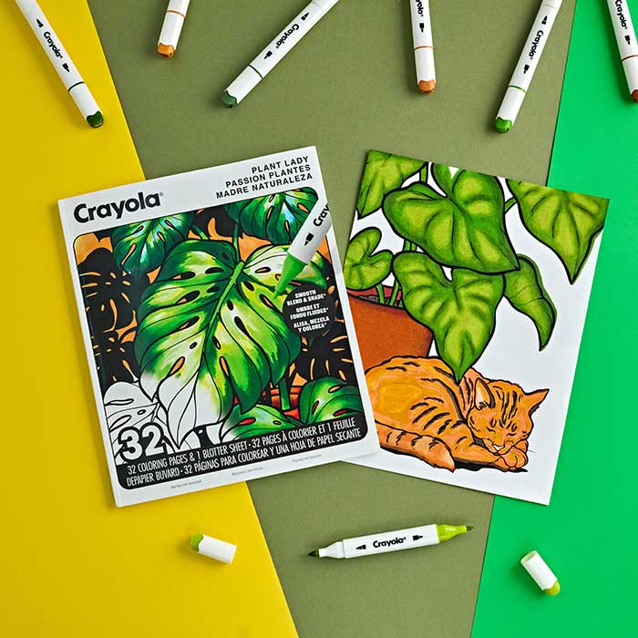 Plant Lady Adult Coloring Book, 32 Pages. Book and colored pages surrounded by crayola alcohol makers.