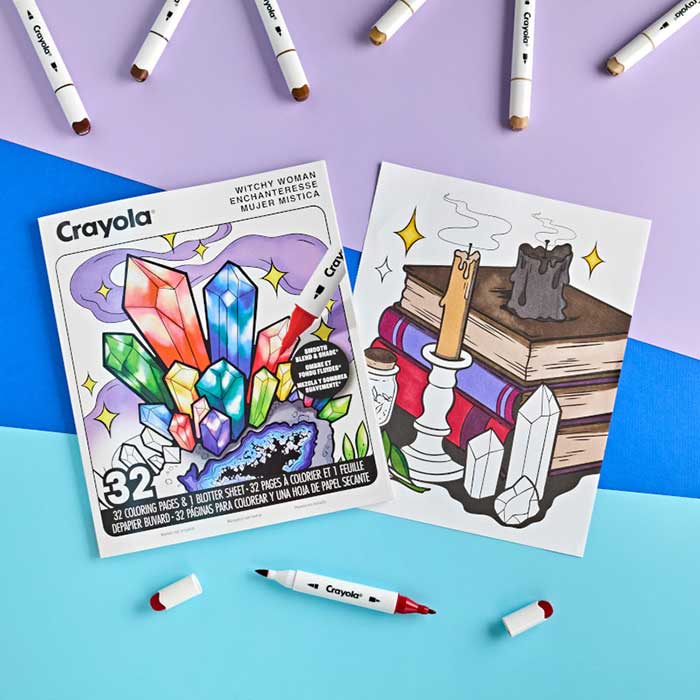 Witchy Woman Adult Coloring Book, 32 Pages. Book and partially colored page surrounded by crayola alcohol markers.