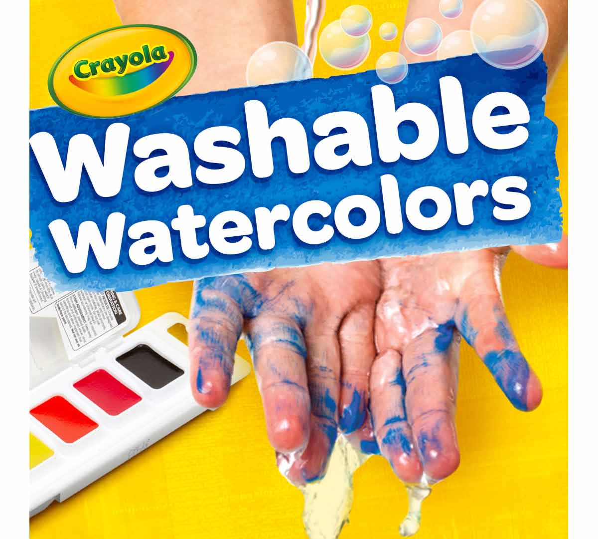 Washable Watercolor Paints  8 count. Washable watercolors.  Hands with blue paint held under stream of water.