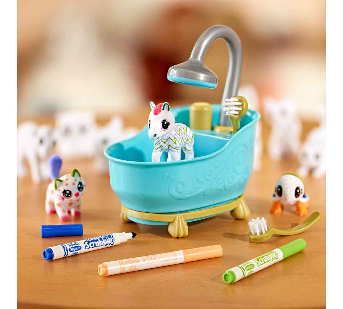 Scribble Scrubbie Mega Pack. decorated pet in bath tub with markers on a table